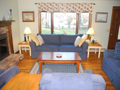 Bright, comfortable living room with ample seating.