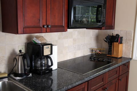 Kettle, coffee maker, microwave and stove (not pictured toaster oven and toaster