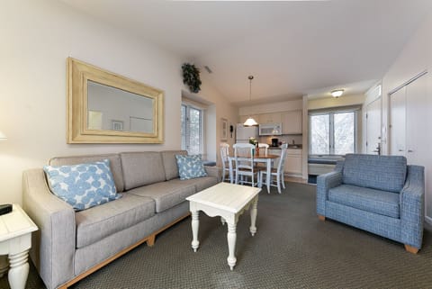 Surrounded by towering pines and the gentle sounds of a flowing creek, this renovated Shores studio offers peace, privacy, and the perfect setting for a romantic bayfront getaway.