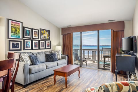 Wake up to lake breeze and drift to sleep with sunsets over East Grand Traverse Bay.
