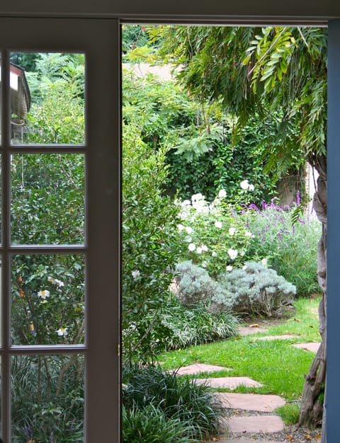 View out  to your Secret Garden Hideaway magical backyard