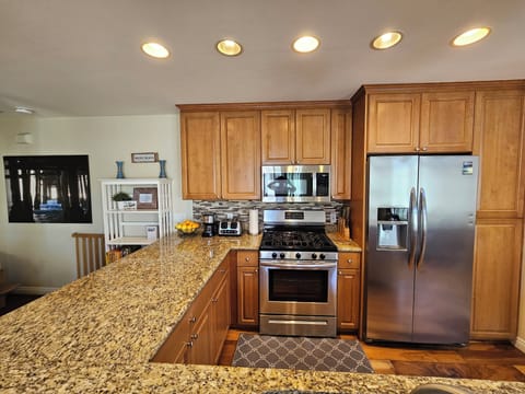 Kitchen with all new appliances, toaster, coffee and Nespresso makers
