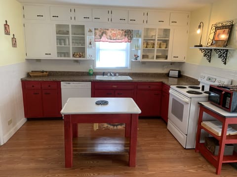 The spacious kitchen has all the supplies you need to do all your own cooking.