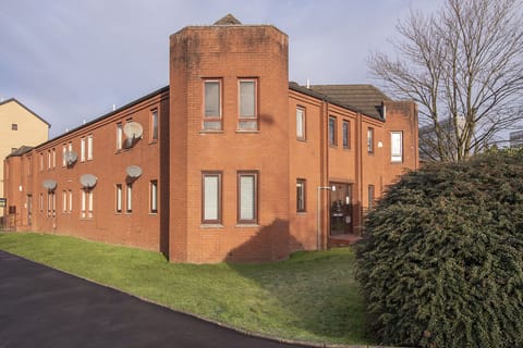Front of ground floor flat with security door entrance 