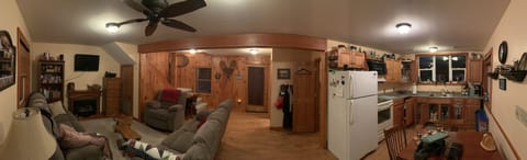 Panoramic view of kitchen and living room