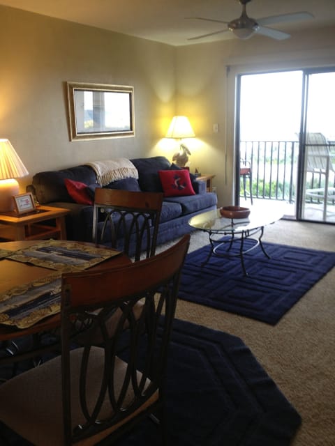 Living room/dining area. Shows old flooring- new photos coming soon!