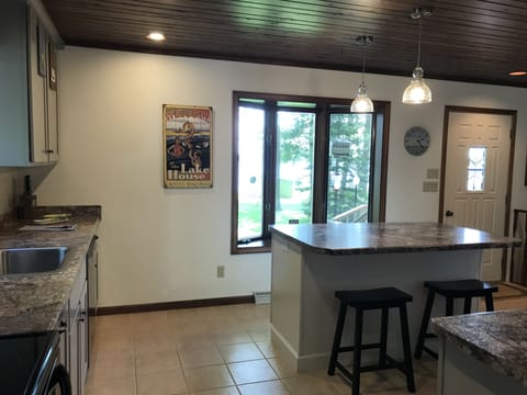 Kitchen with view of Lake. Grab your coffee and enjoy the view.