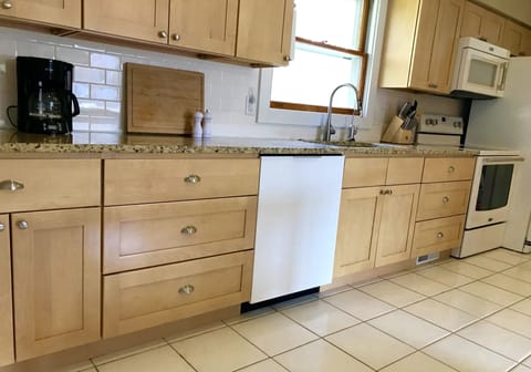Recently remodeled kitchen with new appliances.