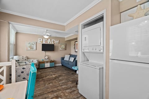 Beautiful dining area by the window, located between the living and kitchen space. 

Convenient in-unit laundry so you can pack light.