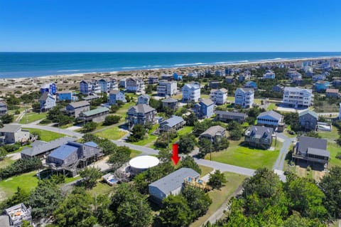 Surf or Sound Realty - 118 - Flippin Sweet - Exterior -2 - Arrow