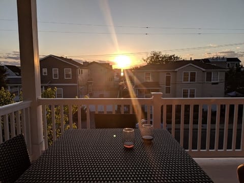 Sunset from upper deck outdoor dining area, covered to keep the seagulls at bay