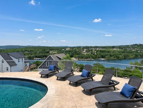 Lounge by the pool with gorgeous views of the lake!