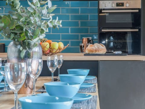 Lovely dining area and adjacent kitchen | The Pendre Longbarn, Pont-Rhyd-y-Groes, near Ystrad Meurig