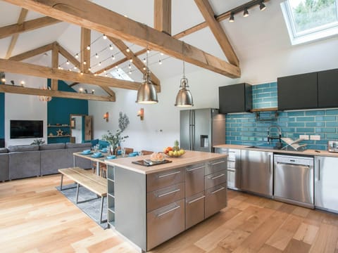 Amazing stainless steel contemporary kitchen | The Pendre Longbarn, Pont-Rhyd-y-Groes, near Ystrad Meurig