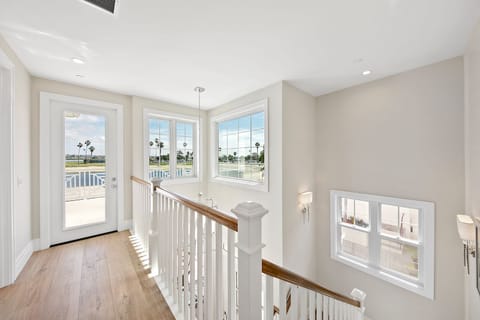 Second level offers great deck, Master bedroom, another bedroom with King bed and laundry room