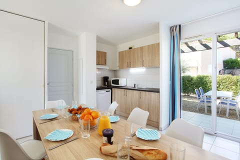 Sit down with family and friends in the dining area.