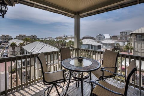 Outdoor Table and Chairs in the Balcony.