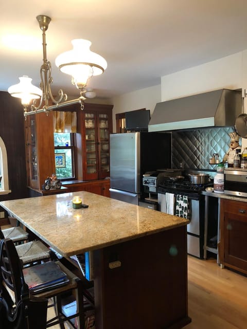 Large kitchen with large island. Gas stove, gas griddle and ice maker