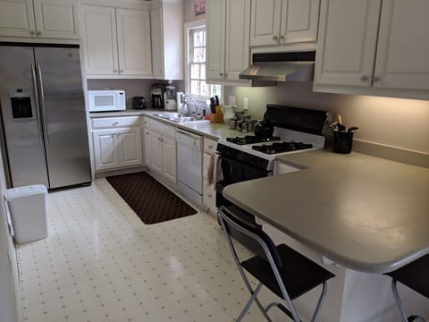 New gas stove as of 2022 not shown here. Range hood vents to the outside