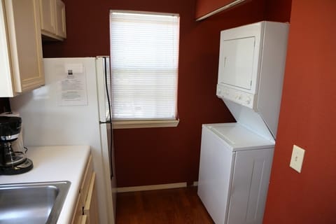 Laundry Room in condo with Washer and Dryer.