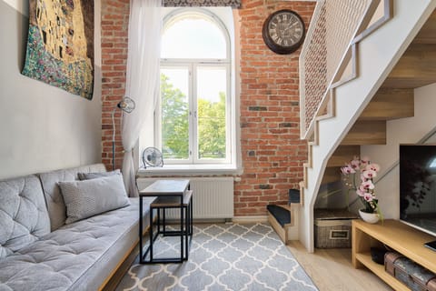 19th-century charm, modern comfort—exposed brick near Old Town.