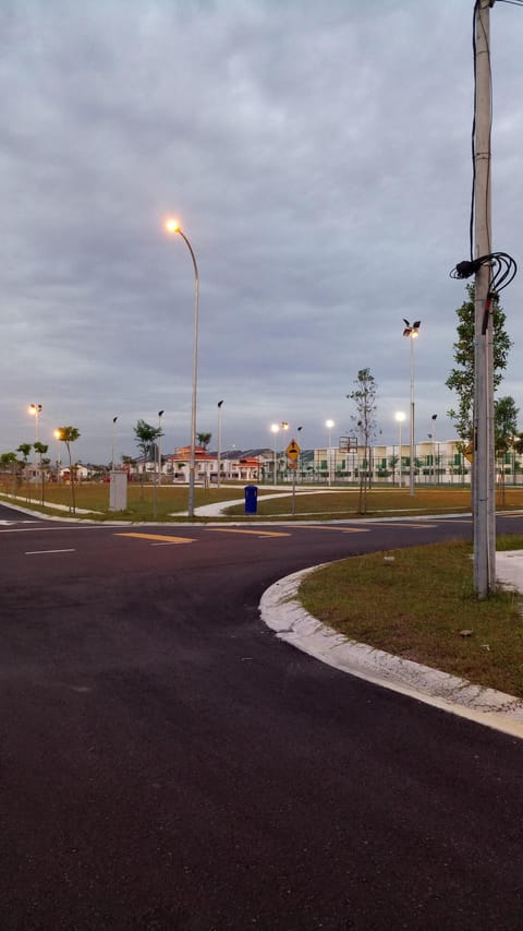 A minute away is a community park with a basketball, football and badminton cour