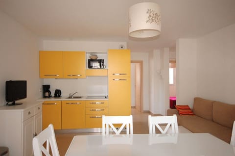 Relax in the colourful open-concept living area.