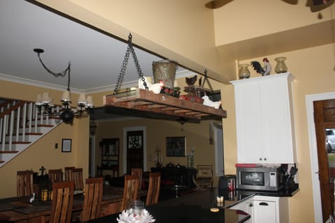 View from kitchen to dining area and front door.
