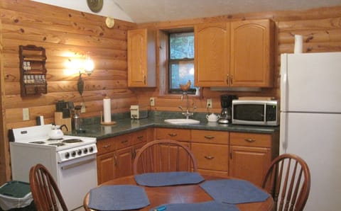 Full size fridge. Convenient kitchen.