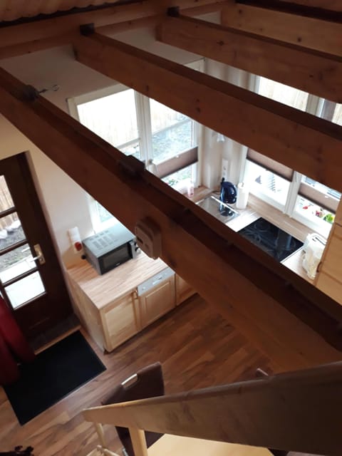 Sunny holiday home with a cozy sleeping loft, idyllically located in the garden. House in Mecklenburg-Vorpommern, Germany