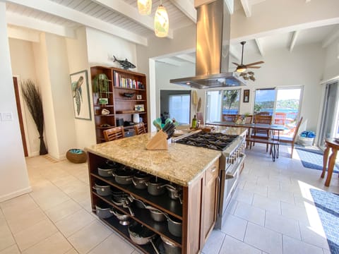 Open floor plan Chef's Kitchen that seats 4 at bar & seats 8 at indoor table