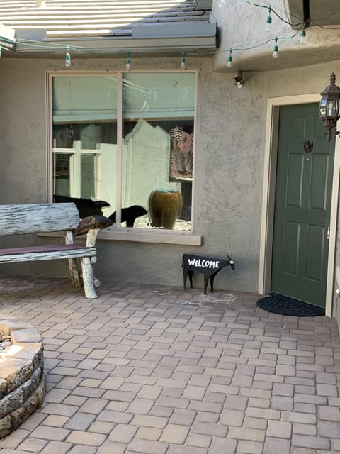 Courtyard has natural gas flame feature and flying pig’s 