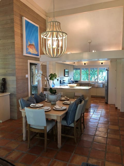 Looking through the Dining area to the kitchen area. High ceilings!