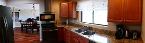 The kitchen and the dining room.