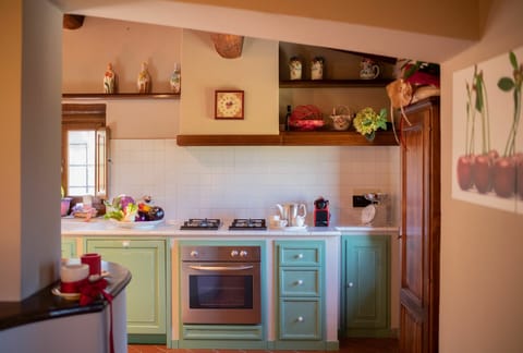 Cabinetry, Countertop, Property, Building, Kitchen, Interior Design, Wood, Kitchen Appliance, Orange, Flooring