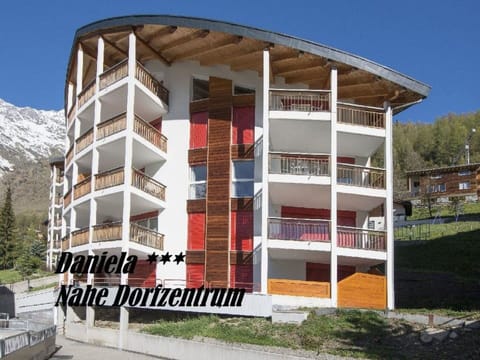 Building, Sky, Property, Plant, Urban Design, Tree, Condominium, Material Property, Facade, Residential Area