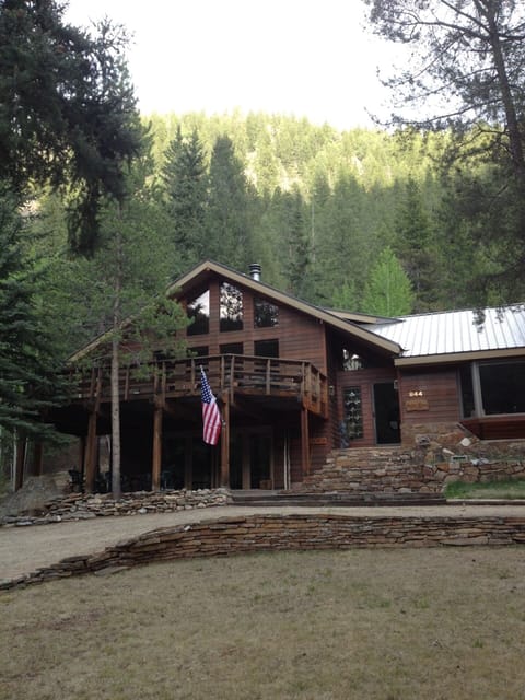 Left of the entry is the upper balcony. Below is the covered patio.