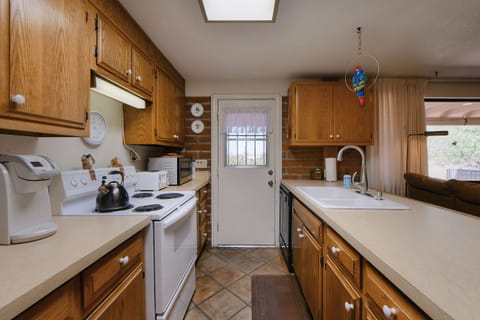 Kitchen area and door to patio. This is your private entrance from patio.