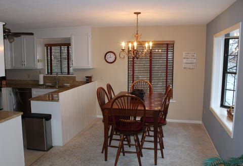Dining area with table that seats up to 8.