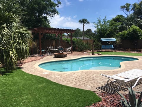 AstroTurf surrounding pool patio