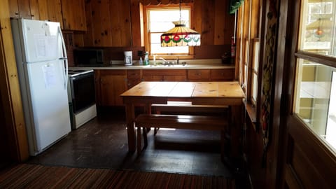 kitchen - table seats 6 on benches, can extend