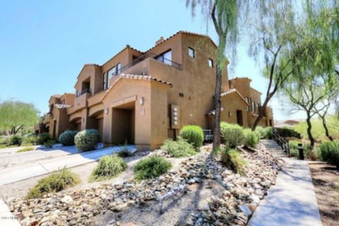 End Unit with attached 2 car garage backs to walking trail and gazebo