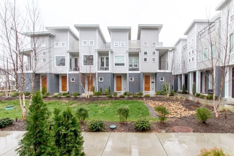 The modern townhouse complex on 2nd Ave is a striking Nashville address with clean architecture and mature landscaping.
