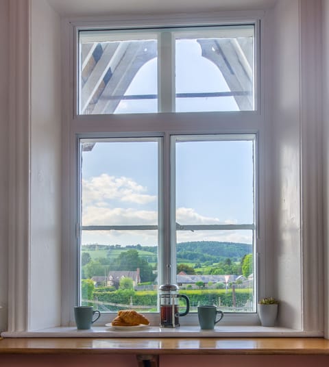 Enjoy a hot drink while looking out over Bucknell Mynd (hill)