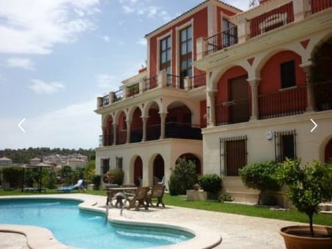 Ground Flr left leading to communal garden and pool