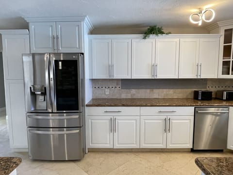Fully Stocked Kitchen Dishwasher, 2 Refrigerators, 2 Stoves, Tons of Cookware!