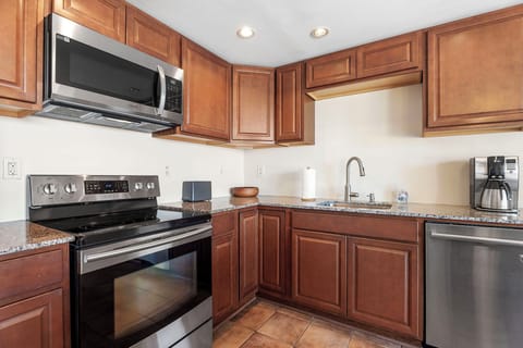 Functional and modern kitchen, fully equipped for your cooking adventures.