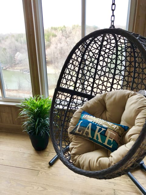 Large 4 seasons sunroom with comfy seating overlooking beautiful SML 