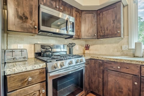 Whether you're meal prepping or just pouring wine, the layout makes it easy and the cabinets are stocked.