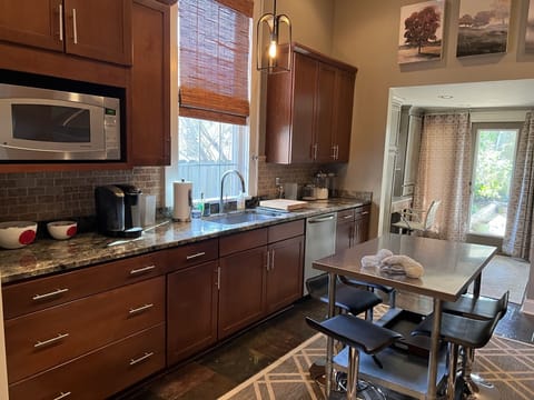 Double sided kitchen: Microwave, coffee area, sink area to prep your meals!